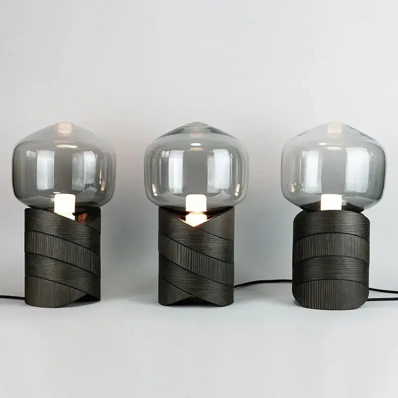Three modern table lamps with dark textured resin n823 bases and translucent gray smoked glass domes for bedroom decorbites creative resin lighting