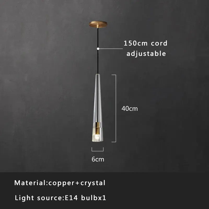 A sleek modern pendant light with clear crystal body and copper accents in decorbites crystal copper pendant set