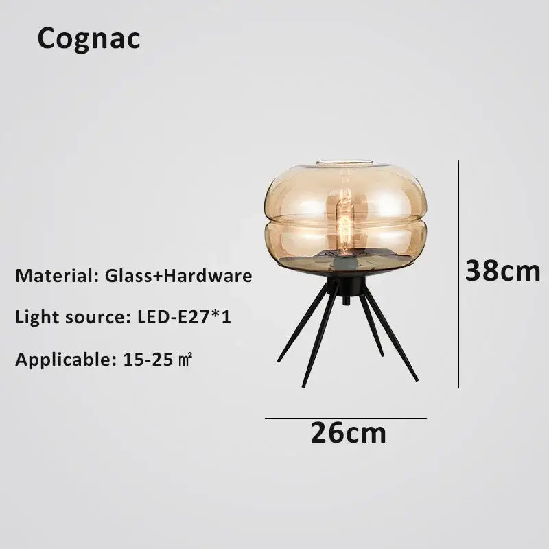 Amber-tinted glass desk lamp with black metal tripod base modern decorbites glass desk for bedroom use