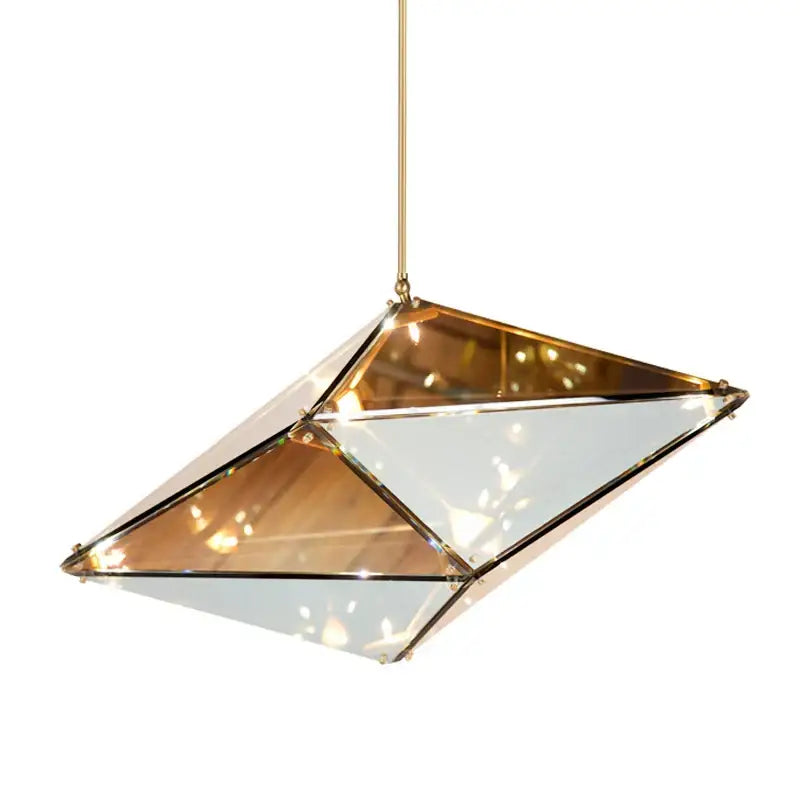 Modern smoky gray and amber diamond glass led pendant light with geometric mirrored facets and brass frame for living room