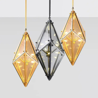 Three geometric amber and clear diamond glass led pendant lights with gold frames and clock faces for living room