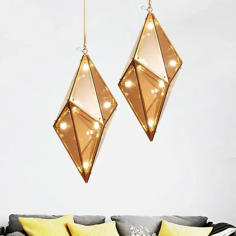 Gold-toned geometric glass led pendant light with diamond glass panels and warm interior lighting for living room use