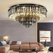 Modern smoky gray and gold decorbites crystal led chandelier with black metal frame and cascading sparkling crystals for living room decor