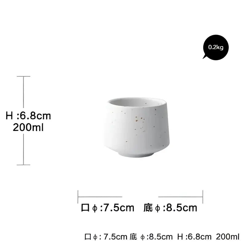 White speckled ceramic cup with minimalist design and rounded rim from modern speckled white ceramic dinner plate set