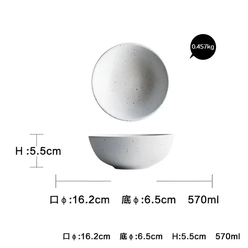 A white speckled ceramic plate set with a matte finish and rounded edges for modern dinner plate set use