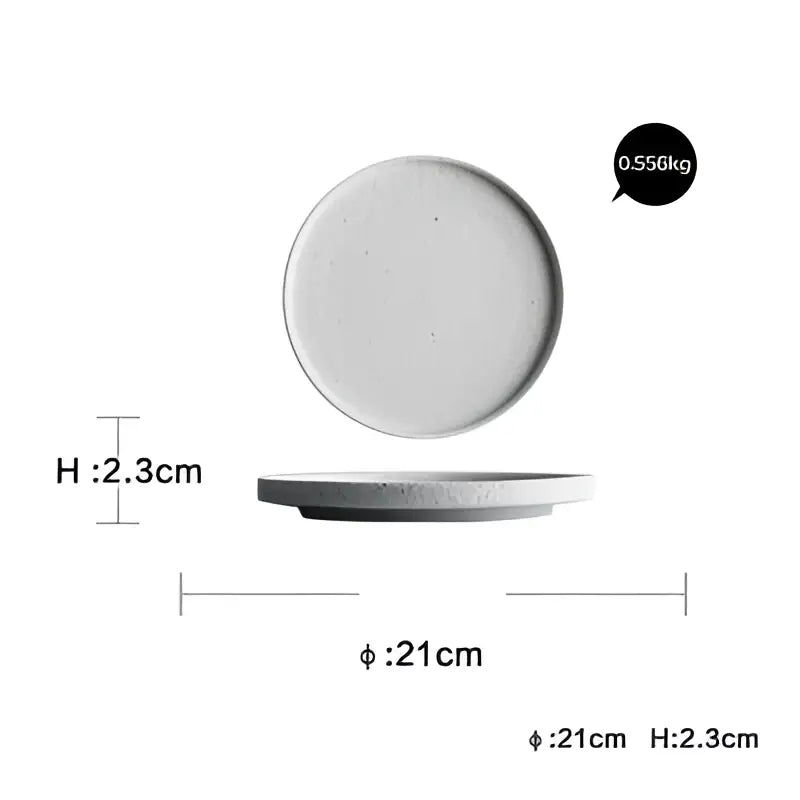 Modern speckled white ceramic dinner plate set with minimalist textured surface and slightly raised rim for dining use