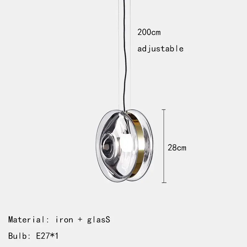 Modern spherical glass pendant lights with transparent glass, polished iron frame, and gold band for living space