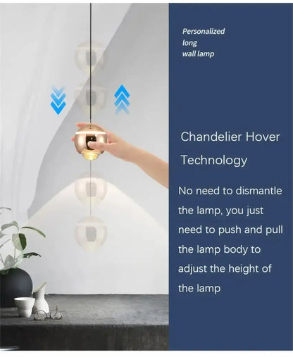 A sleek gold-toned modern spherical pendant light with transparent glass accents for decorbites led bedside lifting
