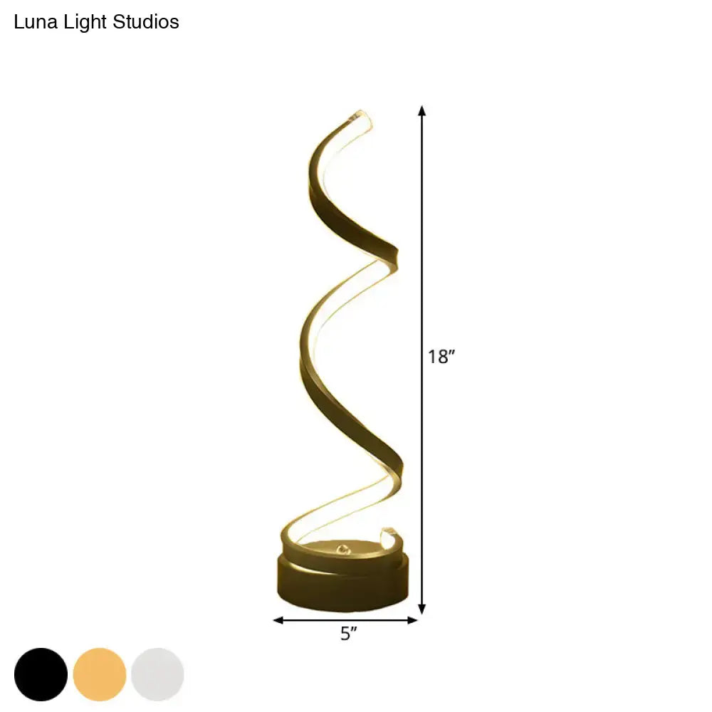A sleek 18-inch tall gold spiral led floor lamp with illuminated curves in black white gold finish for task light