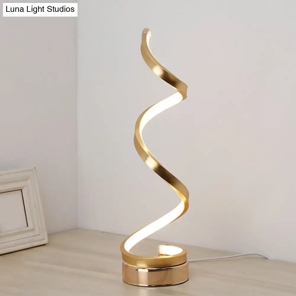 Gold spiral led table lamp with black white gold accents featuring warm white illumination for bedroom task light