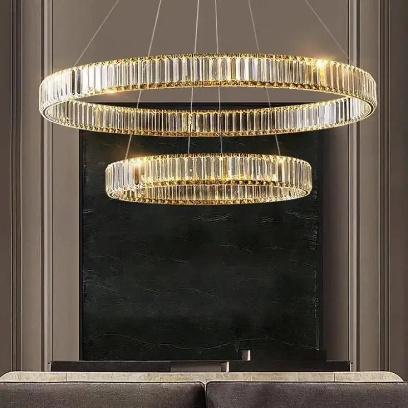 Modern spiral crystal circle led chandelier with double-tiered faceted crystal rods illuminated by warm golden light decorbites crystal circle