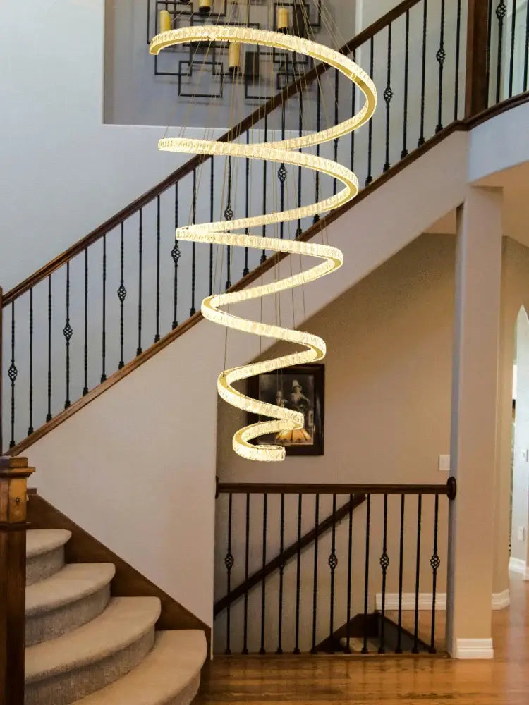 Modern spiral crystal pendant chandelier with warm glowing light and crystal accents for living room decorbites crystal pendant