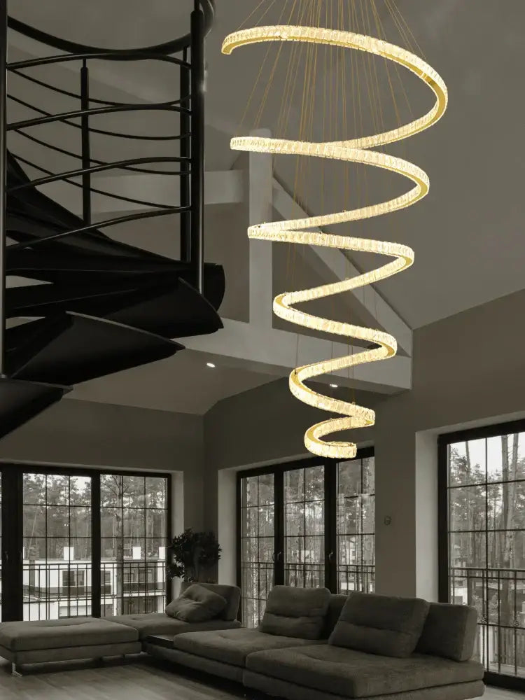 Modern spiral crystal pendant chandelier with golden hue crafted from crystal and metal for living room decorbites crystal pendant
