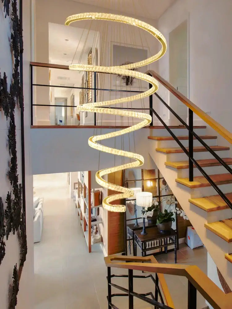 Modern spiral crystal pendant chandelier with golden spiral design and embedded led lights for elegant decorbites crystal decor
