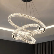 Modern spiral interlocking decorbites crystal chandelier with clear faceted beads and sleek metallic finish for living room