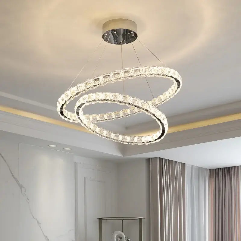 Modern spiral interlocking decorbites crystal chandelier with clear crystal beads and chrome accents for living room use