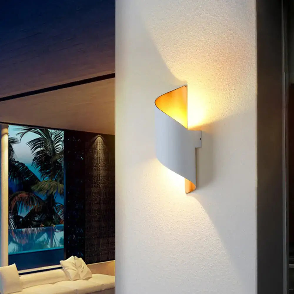Modern spiral white and gold wall sconce with warm light and sleek curved design for direct wired electric installation