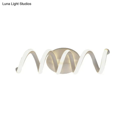 Modern spiral white wall light with sleek wave design and central circular natural warm led sconce for bathroom use