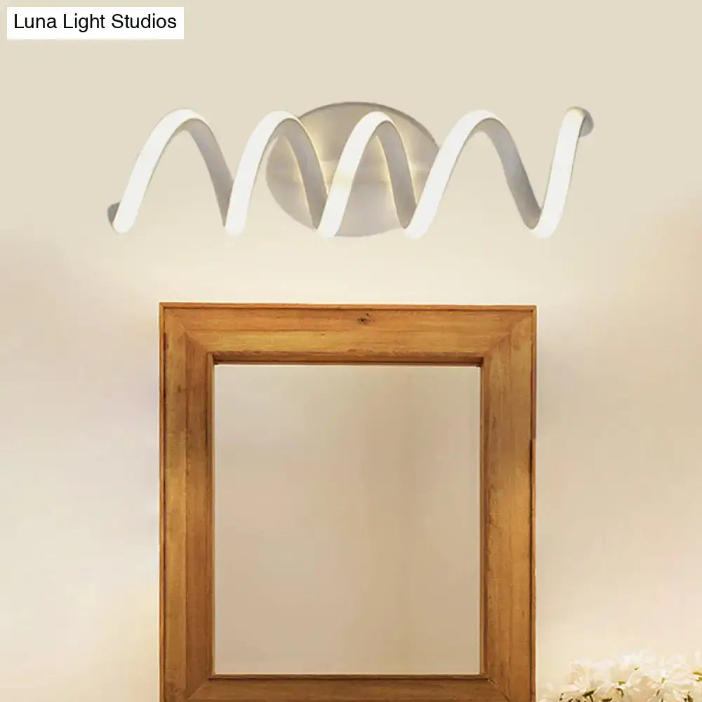 Modern white natural warm led wall light with sleek wavy design and metallic center for bathroom use