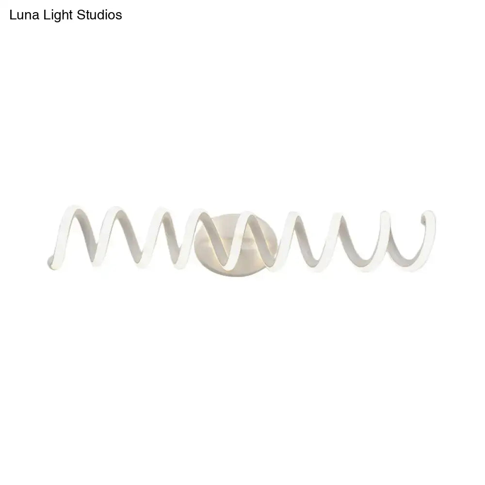 White natural modern spiral wall light with sleek curved design and warm led sconce for bathroom use