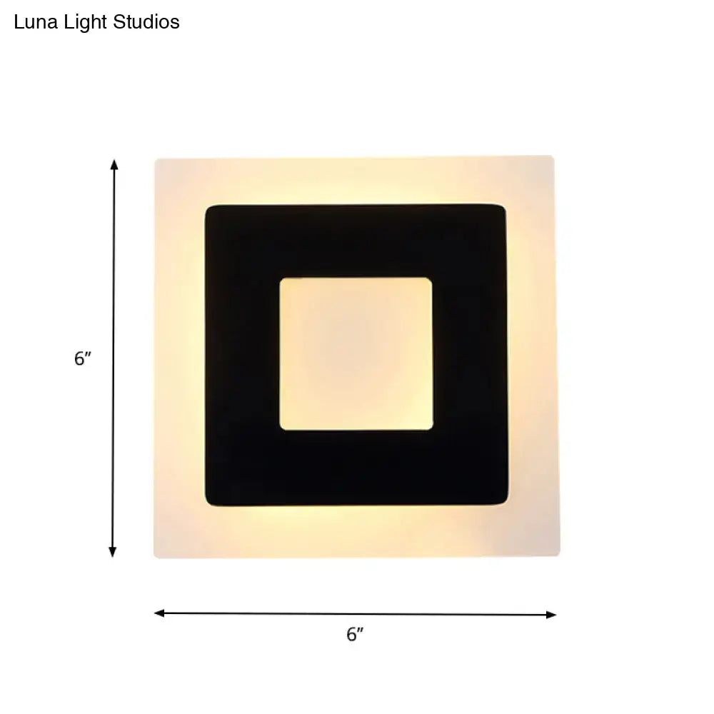 Modern square acrylic led wall sconce in black and off-white with warm white direct wired electric lighting for living room