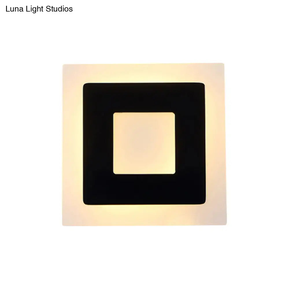 Modern square acrylic led wall sconce with black frame and warm white direct wired electric light for living room
