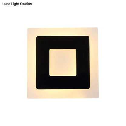 Modern square acrylic led wall sconce with black frame and warm white direct wired electric light for living room