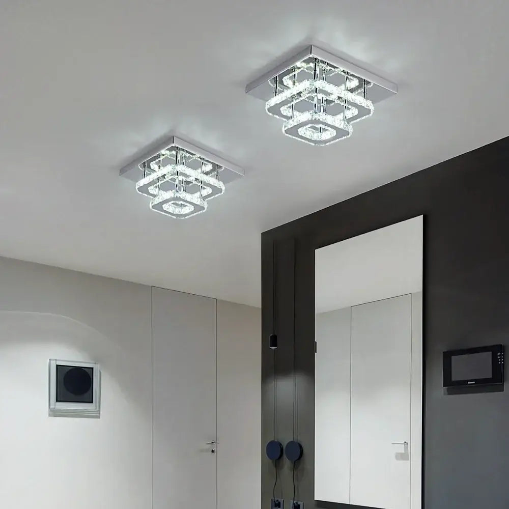 Modern square chrome crystal led ceiling chandelier featuring layered crystal rings for elegant living room decorbites decor