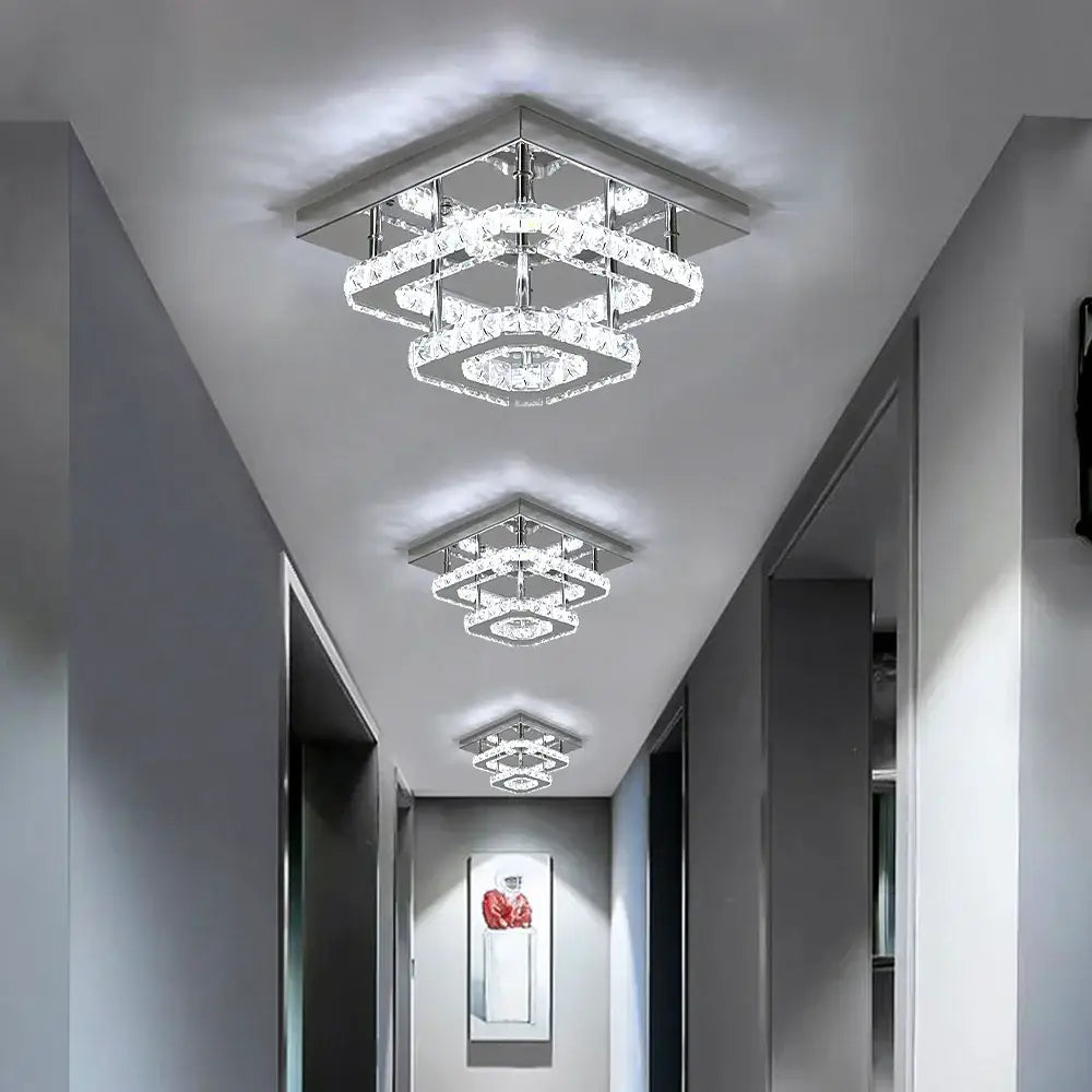 Modern square led crystal ceiling chandelier with layered crystal rings and chrome accents for dining room decorbites crystal ceiling