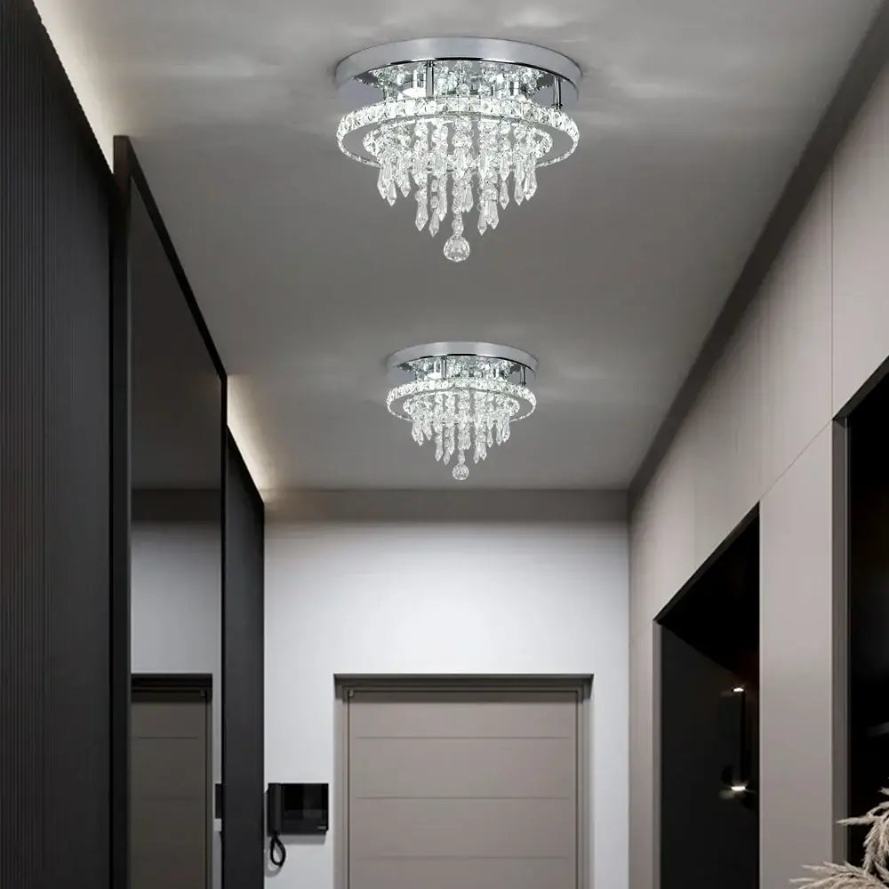 Two identical modern square crystal flush mount ceiling lights with chrome bases and clear glass prisms for kitchen use