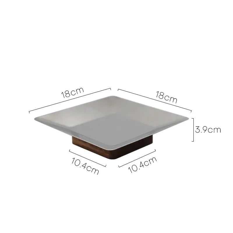 Modern square fruit bowl tray featuring a matte white ceramic top and dark wood base for living room use