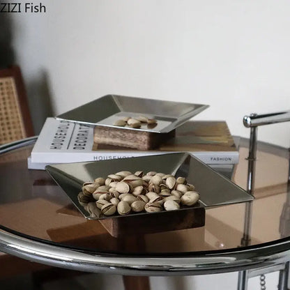 Silver metallic square fruit bowl tray with sleek modern design and slightly raised edges for living room use