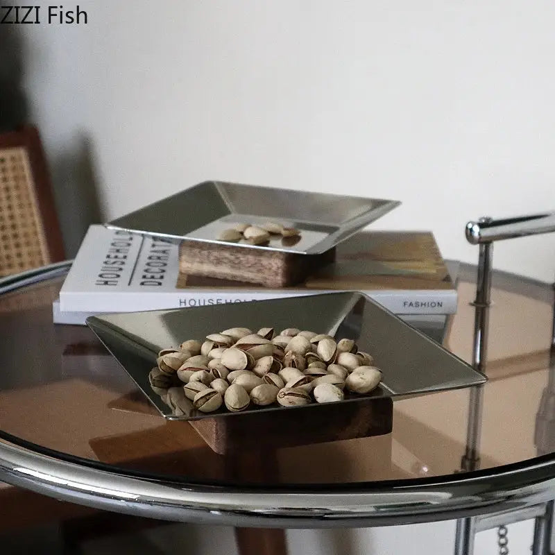 Silver metallic square fruit bowl tray with sleek modern design and slightly raised edges for living room use
