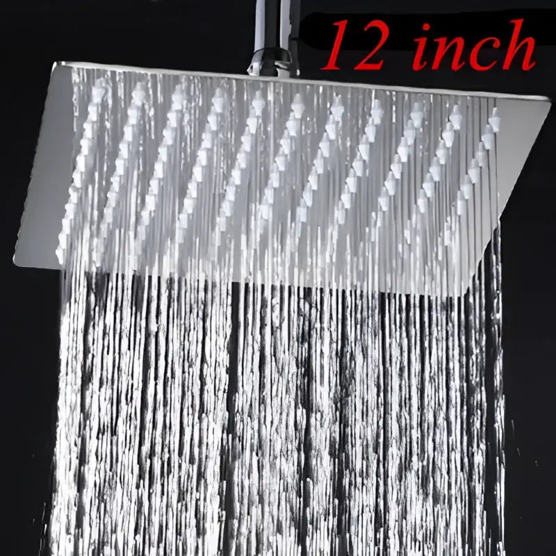 A sleek 12-inch polished chrome square rain shower head with multiple jets for modern bathroom use