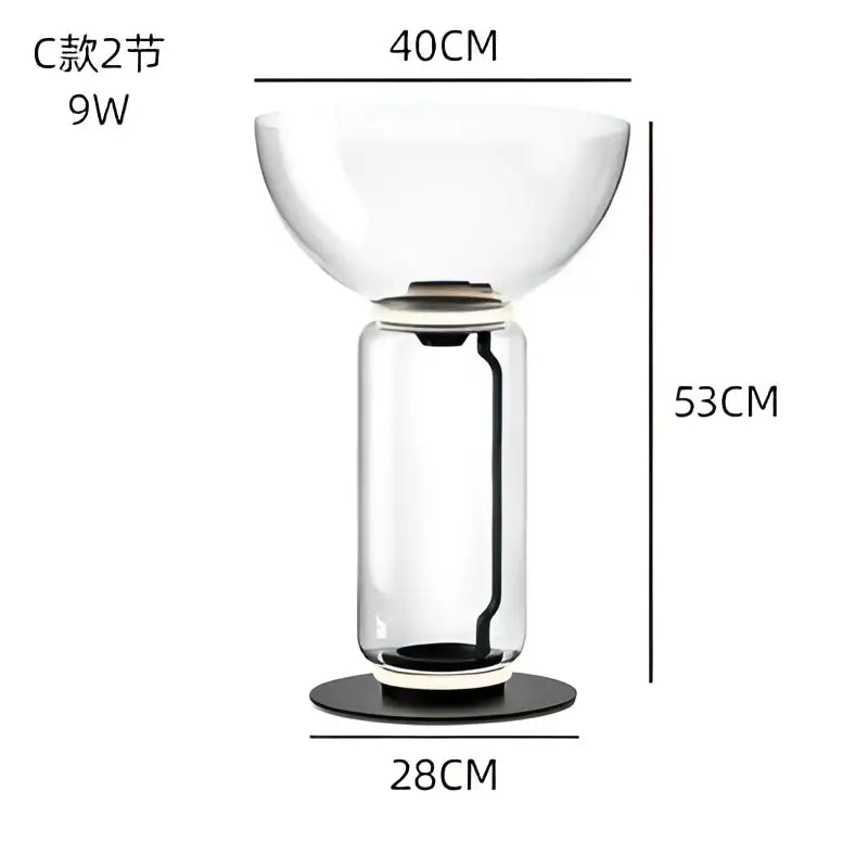 Clear glass led floor lamp with sleek modern design featuring bulbous top and cylindrical base for living room lighting