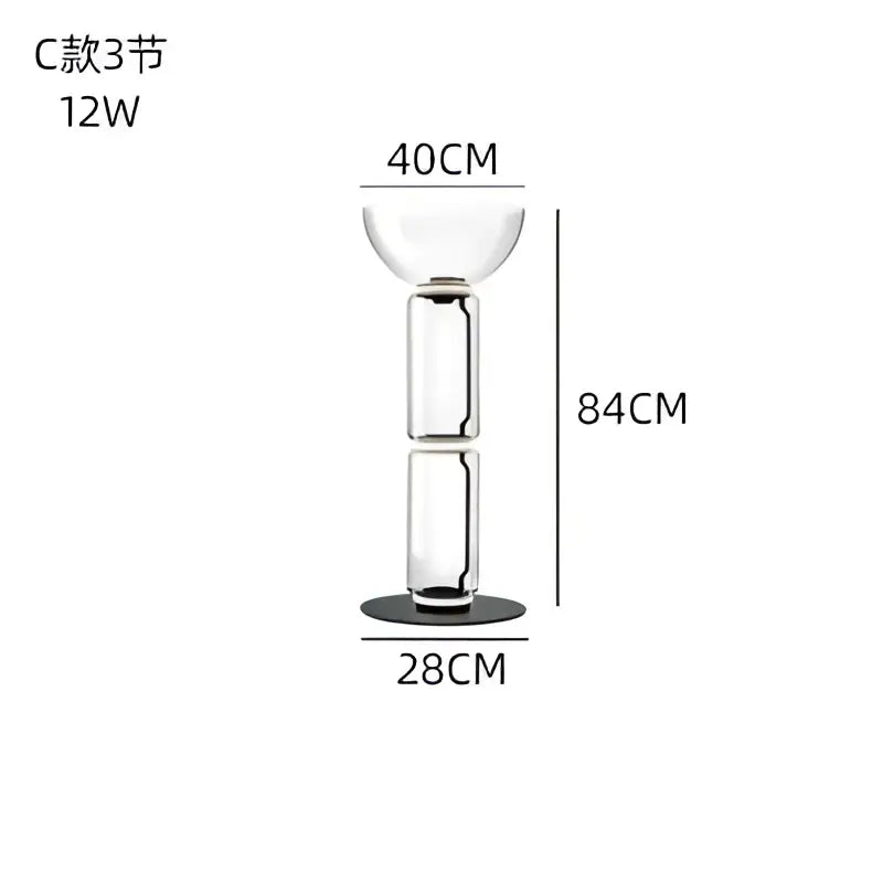 Modern stacked clear glass led floor lamp with three sections and a black base for living room lighting