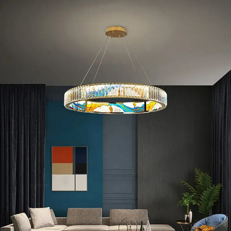 Modern stained glass circle steel led pendant chandelier with gold mount and vibrant blue yellow white crystal panels for living room decorbites circle steel