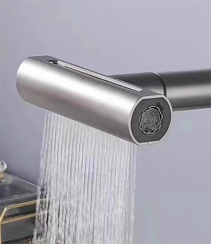 Modern brushed stainless steel and black kitchen faucet replacement spouts with a sleek cylindrical design and hexagonal nozzle
