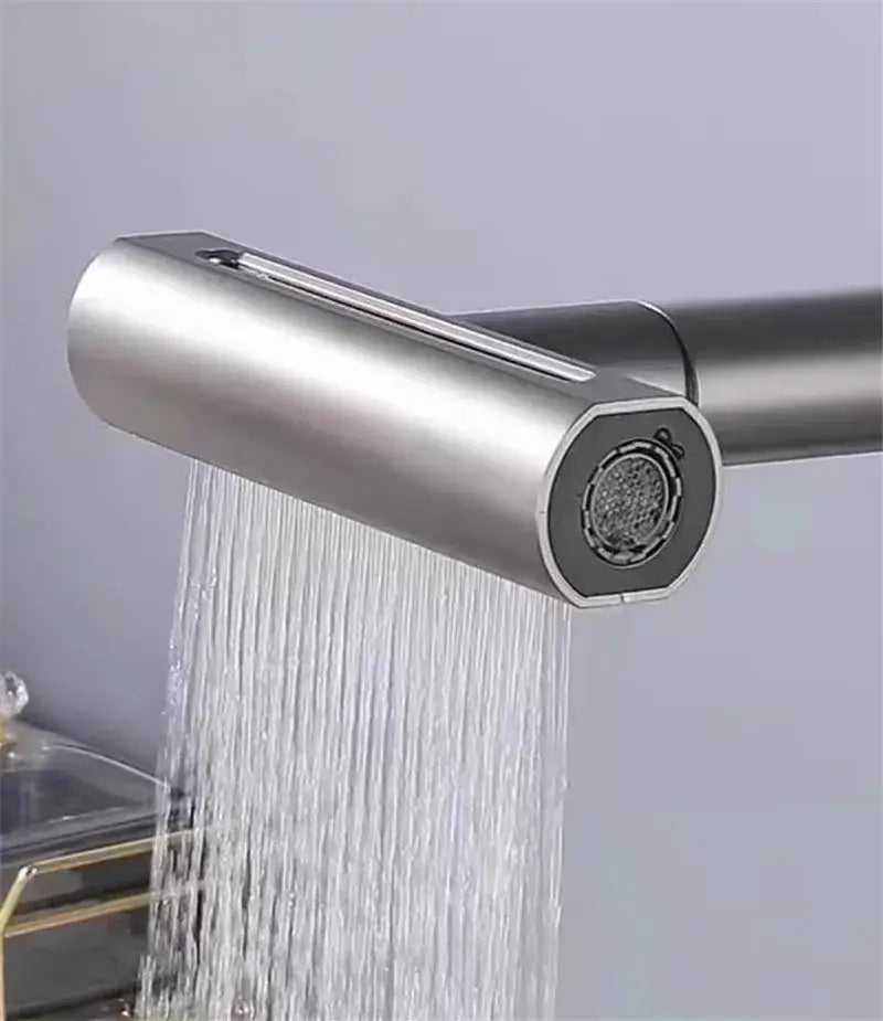 Modern brushed stainless steel and black kitchen faucet replacement spouts with a sleek cylindrical design and hexagonal nozzle