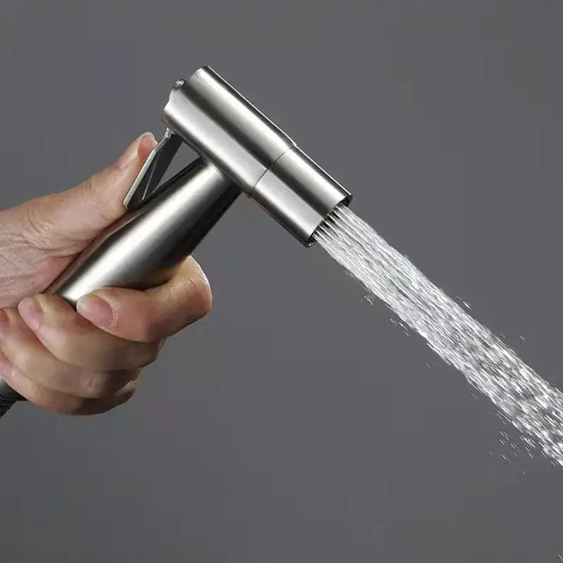 A sleek stainless steel handheld shower nozzle with adjustable spray in decorbites bidet washbasin mixer set