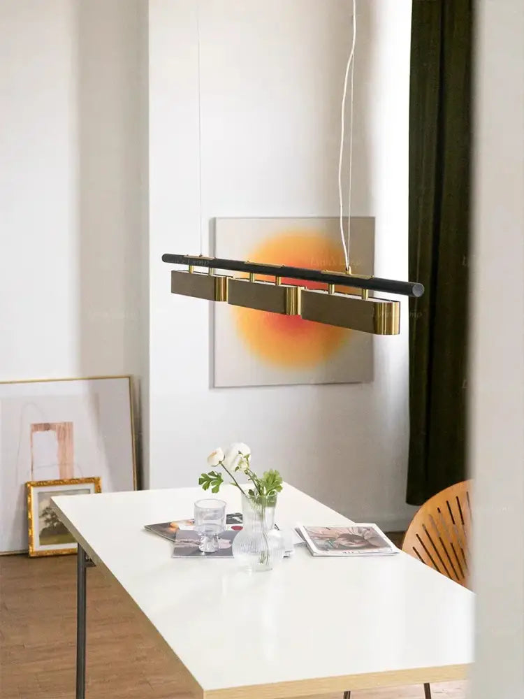 Modern stainless steel pendant lamp with black and decorbites brushed gold rectangular design for dining room decor