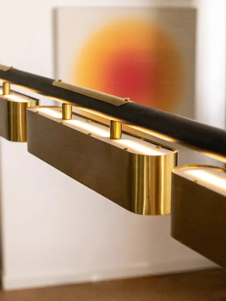 Modern stainless steel brushed gold pendant lamp with brass-finished linear fixtures and warm led illumination for dining room decorbites