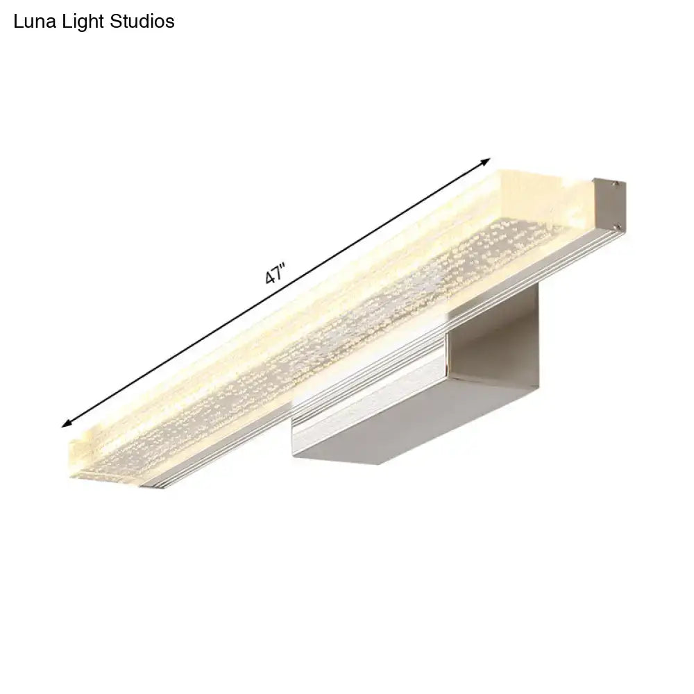 Modern 47-inch stainless steel led bathroom light with sleek metallic finish and frosted glass diffuser shade