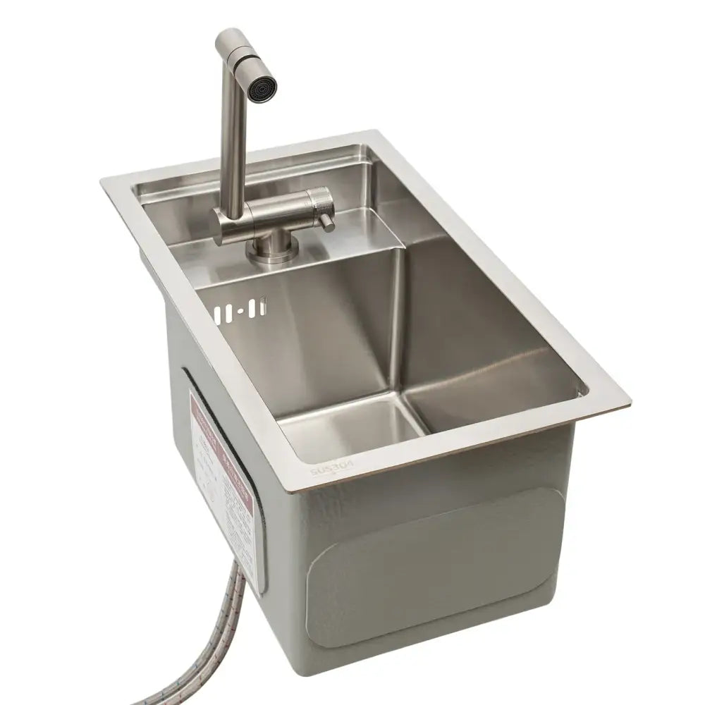 Modern stainless steel single bowl undermount kitchen sink with sleek design and integrated spray nozzle faucet