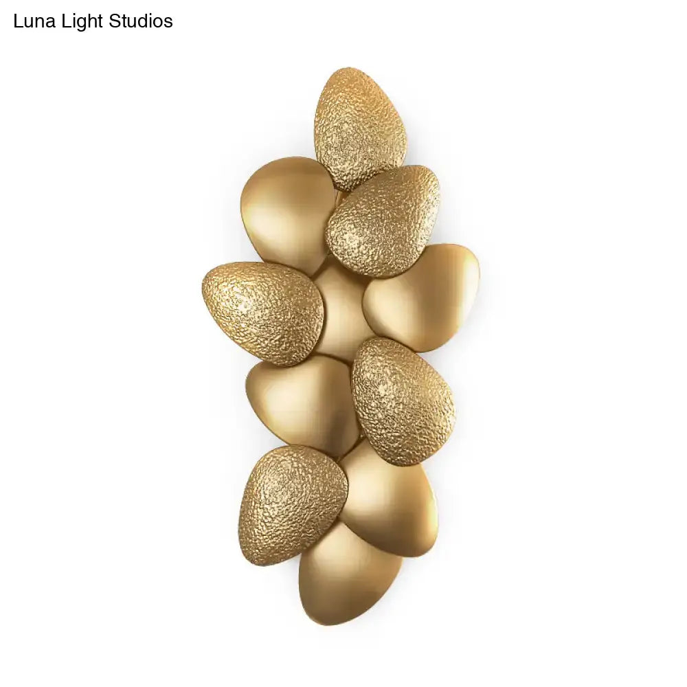 Modern gold-toned textured stone wall art sculpture with clustered design for stainless steel squama wall light decor