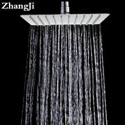 Modern stainless steel square ceiling rain shower head in silver with multiple water jets for bathroom use