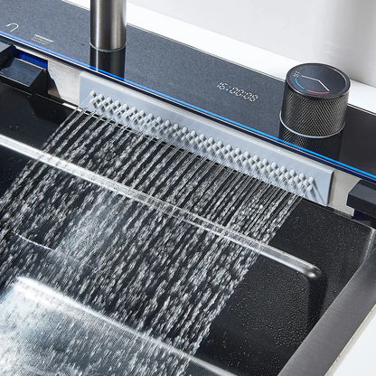 Modern stainless steel waterfall kitchen sink in black and silver with sleek integrated faucet and digital display