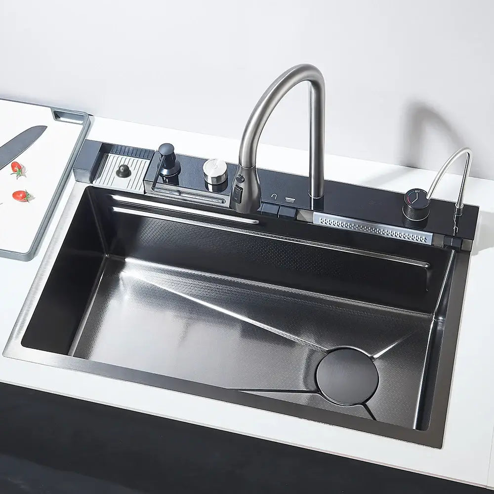Modern black stainless steel waterfall kitchen sink with sleek curved faucet and integrated digital display controls