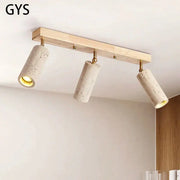 Modern stone and wood 3-head led ceiling spotlight with concrete shades and brass accents for living room lighting