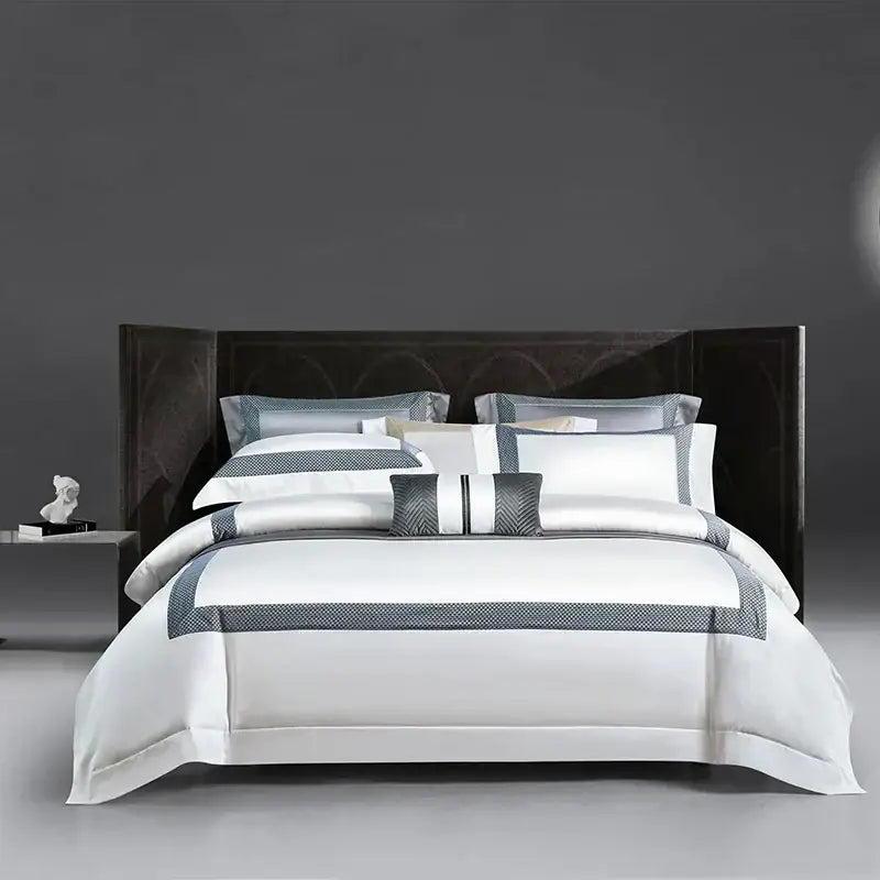 Elegant white satin bedding set with gray geometric trim and matching pillows for decorbites king size luxury use